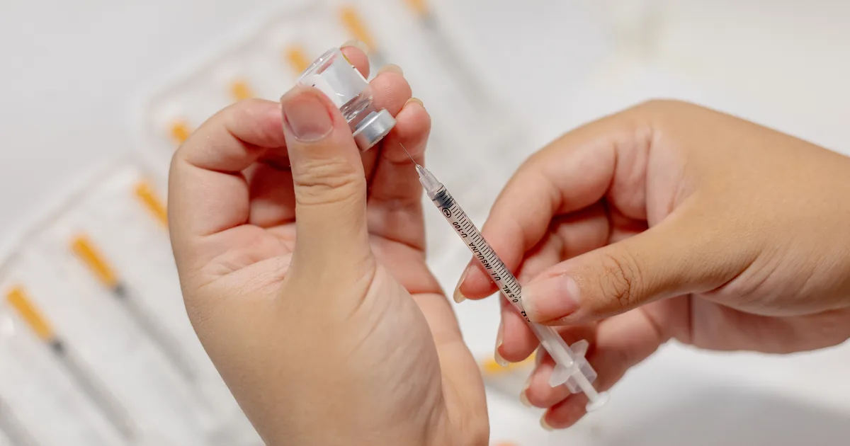 Provider reviewing a physician-supervised peptide protocol with a client at iCRYO South Jordan
