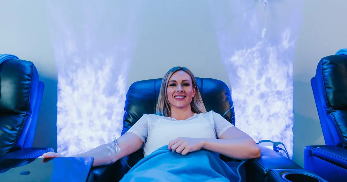 Client receiving IV hydration therapy for energy at iCRYO South Jordan