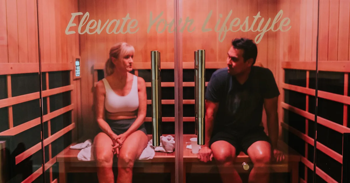 Woman relaxing in an infrared sauna at iCRYO South Jordan, UT
